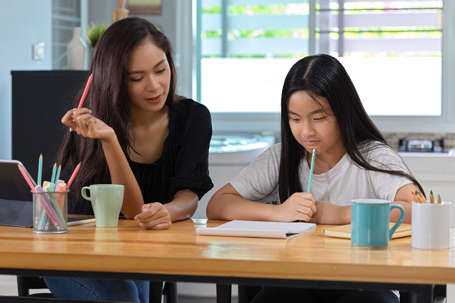 student and tutor together at a desk in Las Vegas